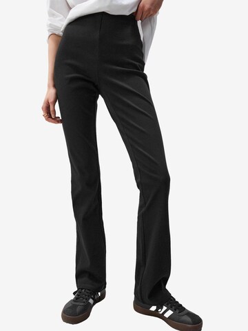 Next Flared Leggings in Black: front