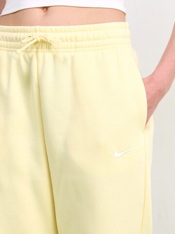 Nike Sportswear Tapered Pants 'PHNX FLC' in Yellow