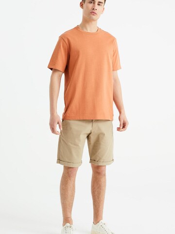 T-Shirt WE Fashion en orange