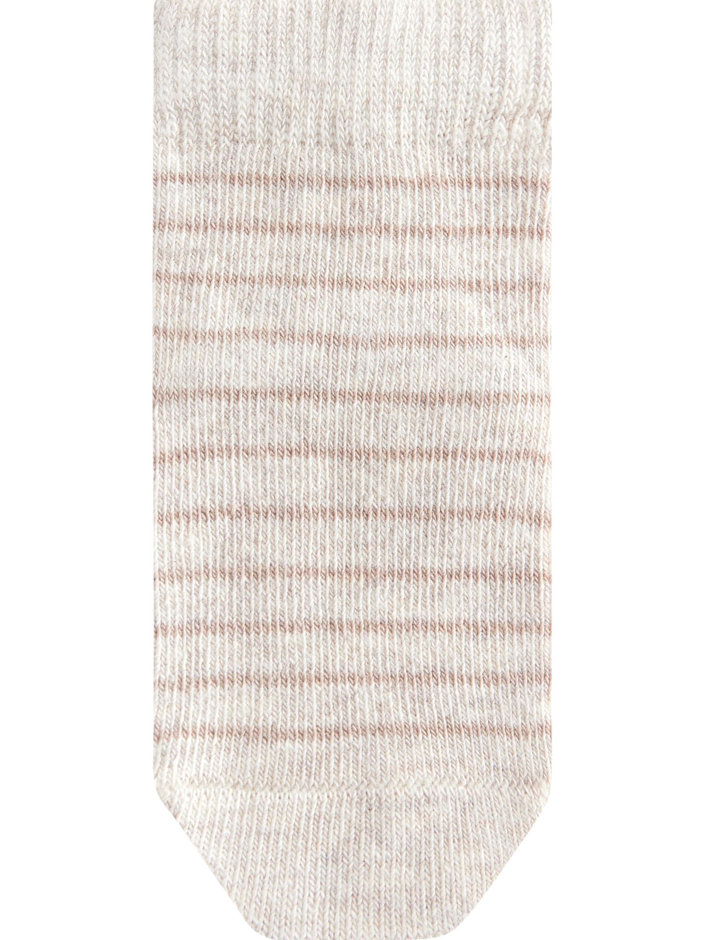 Next Sukat värissä beige