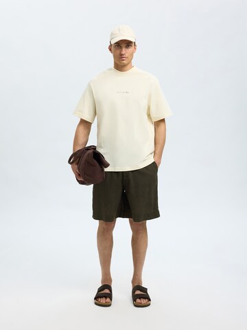 T-Shirt 'SLHKAI' SELECTED en jaune