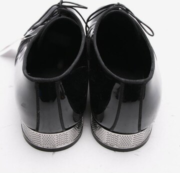 Louis Vuitton Flats & Loafers in 42,5 in Black