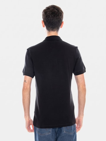 Maglietta di LACOSTE in nero