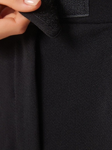 Happiness İstanbul Loose fit Pleat-front trousers in Black