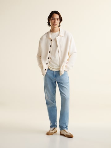 Tommy Jeans Слим фит Дънки 'RYAN' в синьо: отпред