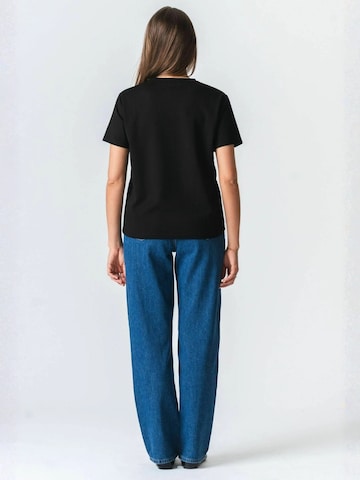 TEESHOPPEN Top ' Loose ' w kolorze czarny