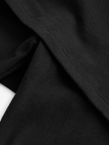 Skinny Leggings di Next in nero