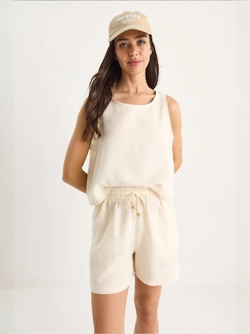 Pantalons de tailleur Bianco Lucci en beige