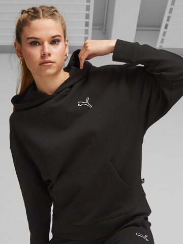 PUMA Sweatshirt 'Essentials' i svart: framsida