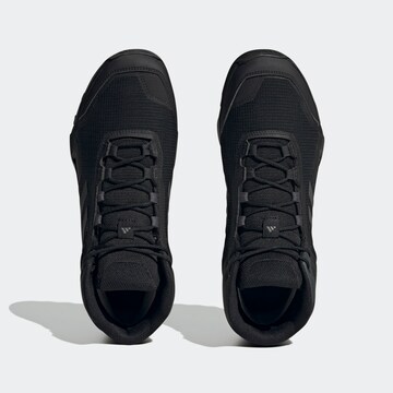 ADIDAS PERFORMANCE Boots in Black