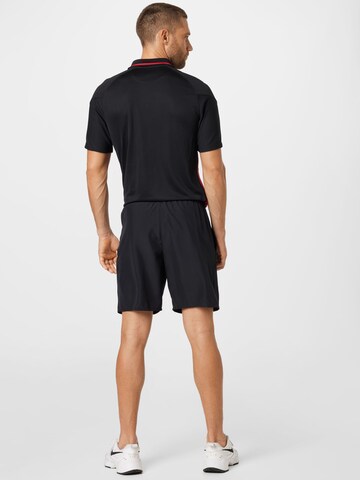 NIKE Regular Workout Pants in Black