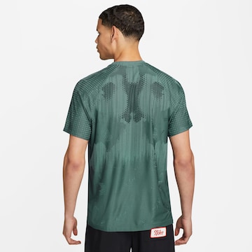 NIKE Funktionsshirt 'Axis Performance' in Grün