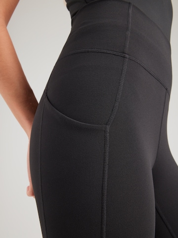 Fabletics Skinny Urheiluhousut 'OASIS ' värissä musta