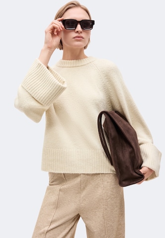 ABOUT YOU Wide leg Pants 'Eleonora' in Beige