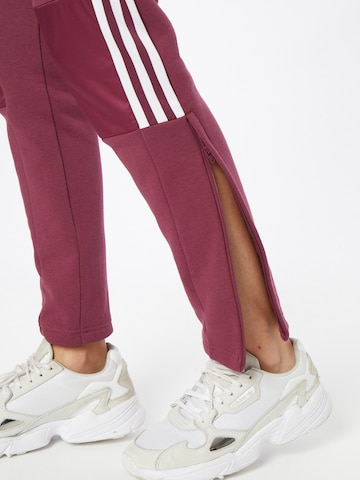 Effilé Pantalon de sport ADIDAS SPORTSWEAR en rouge