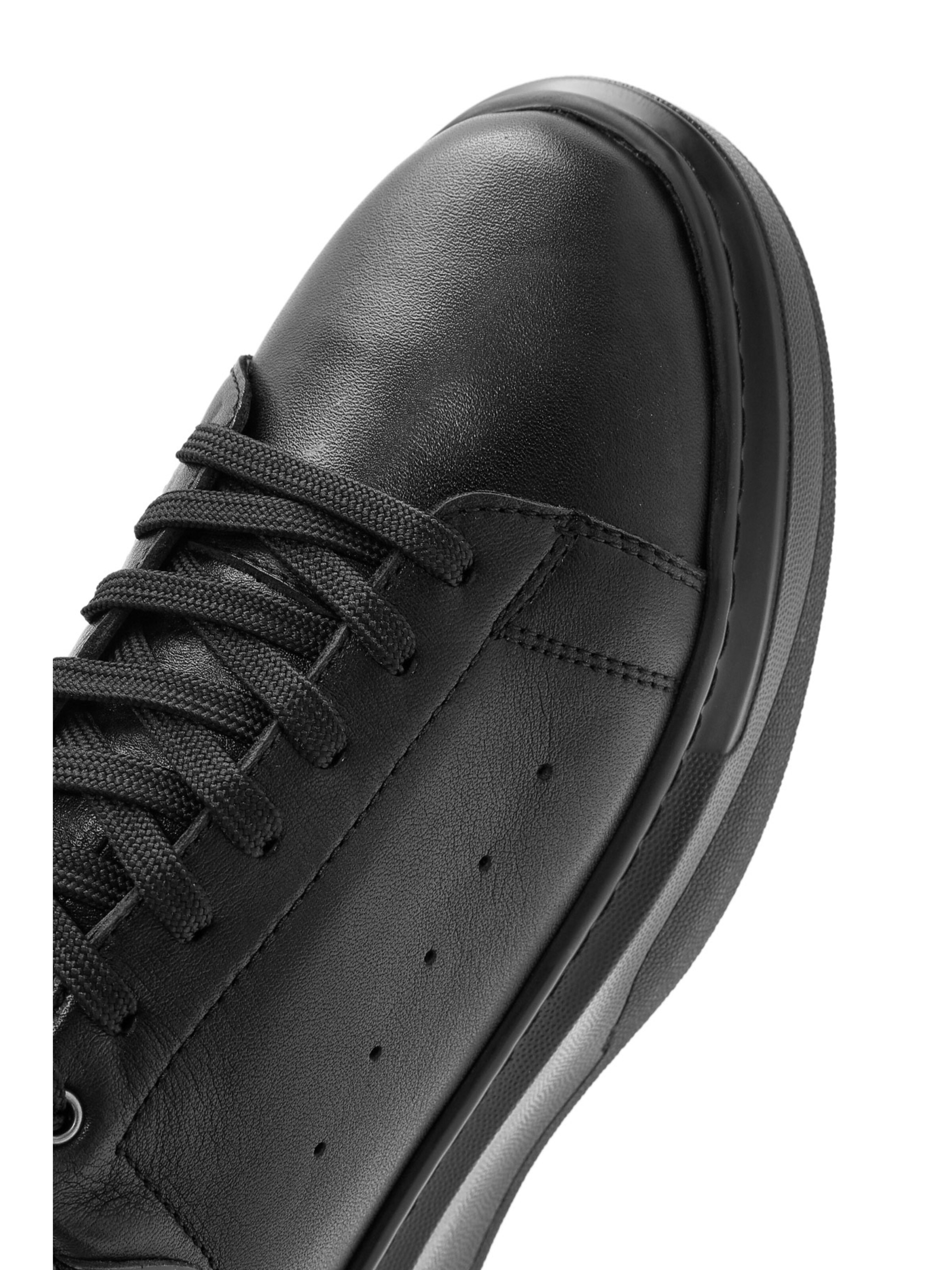 Baskets basses Derimod en noir