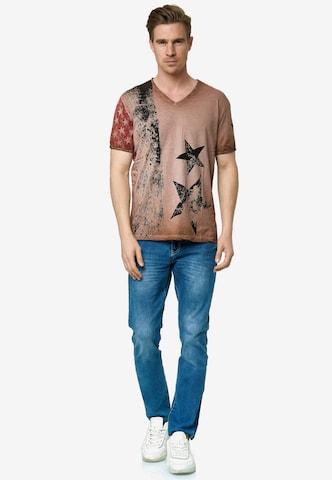 Rusty Neal Cooles T-Shirt mit V-Ausschnitt in Braun