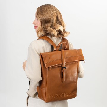 Farmhood Backpack in Brown: front