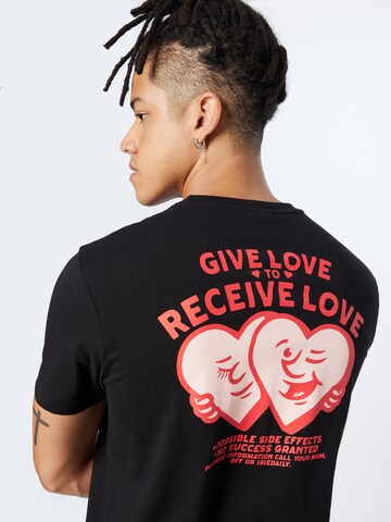 Iriedaily Тениска 'Give 2 Receive' в черно