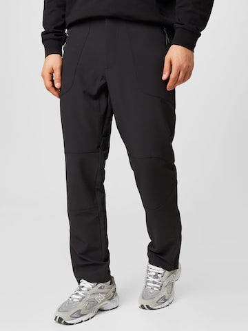 PUMA - Regular Calças de desporto em preto: frente