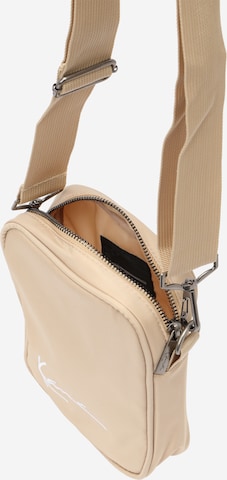 Sac à bandoulière Karl Kani en beige