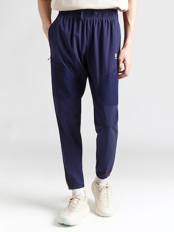 UNDER ARMOUR Normalny krój Spodnie sportowe 'Challenger' w kolorze niebieski: przód