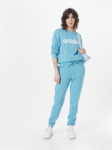 ADIDAS SPORTSWEAR Sportief sweatshirt 'Essentials Linear French Terry' in Blauw