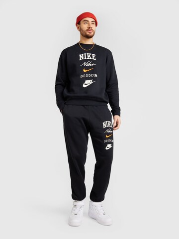 Nike Sportswear Tapered Παντελόνι 'CLUB' σε μαύρο