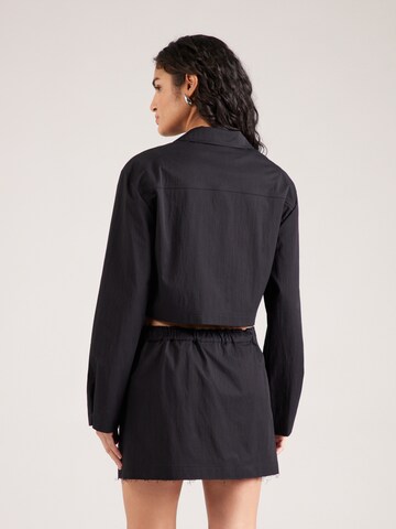 Camicia da donna di Moschino Jeans in nero