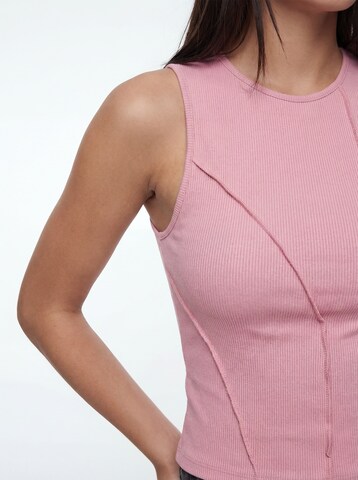 Haut 'Frieda' studioselect en rose