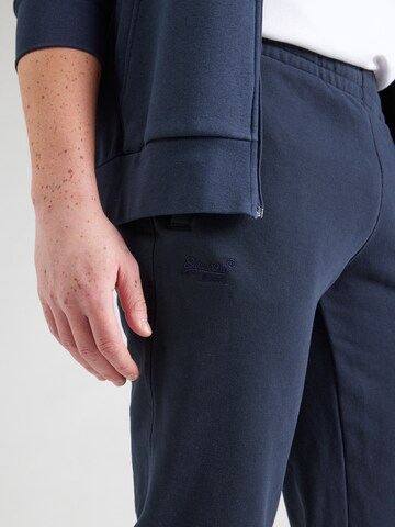 Superdry Tapered Housut 'Essential' värissä sininen