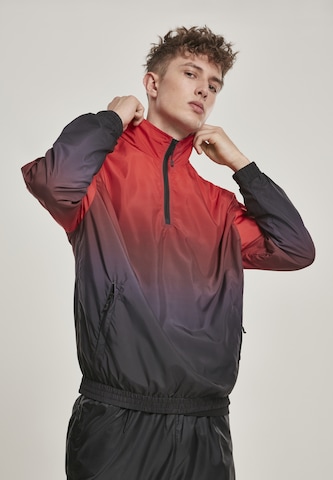 Veste mi-saison Urban Classics en rouge : devant