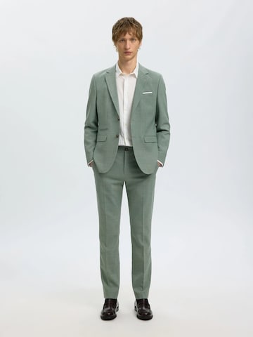 Slimfit Pantaloni '16087871' di SELECTED in verde