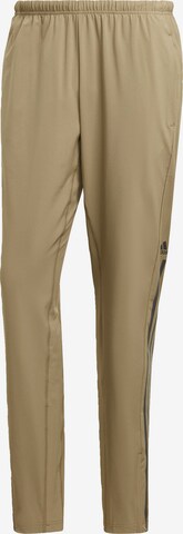 Regular Pantalon de sport 'Alphastrength Zip' ADIDAS SPORTSWEAR en vert : devant
