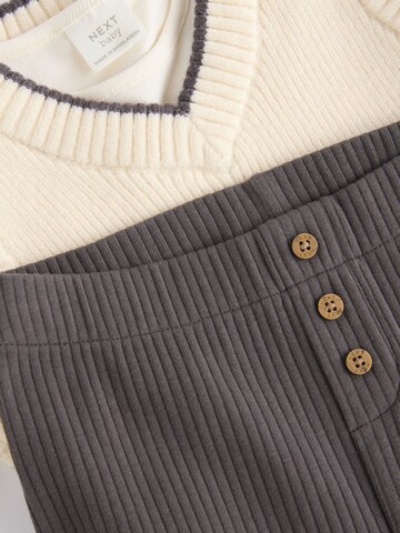 Next - Conjunto en blanco