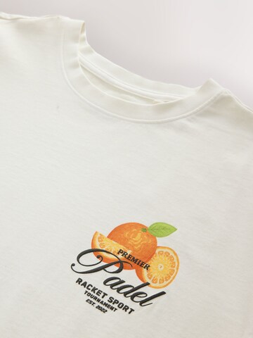 T-Shirt Next en blanc