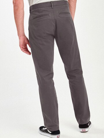 Loosefit Pantaloni chino di Next in grigio