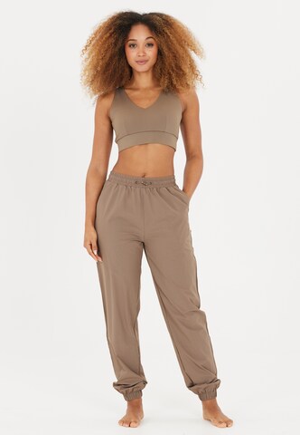 Athlecia Tapered Hose 'Hero' in Grün