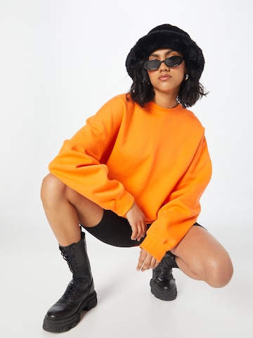 Sweat-shirt WEEKDAY en orange