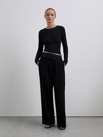 T-shirt Scalpers en noir : devant