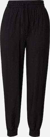 Trendyol Tapered Pants in Black: front