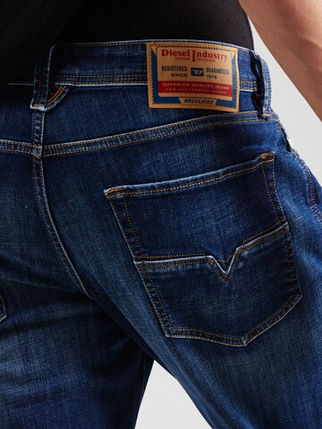 DIESEL Regular Jeans '1986 LARKEE-BEEX' in Blue