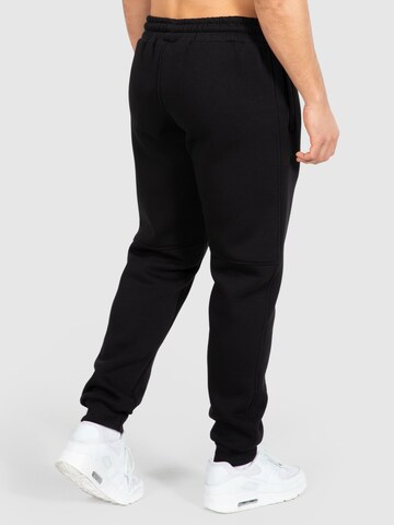 Effilé Pantalon de sport ' Athlete' Smilodox en noir