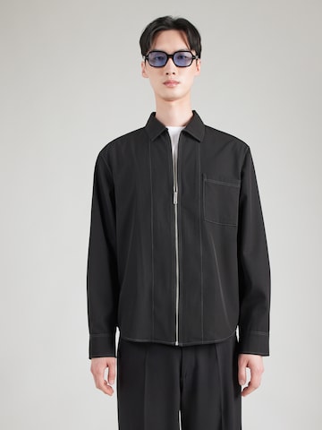 Calvin Klein Between-season jacket in Black: front