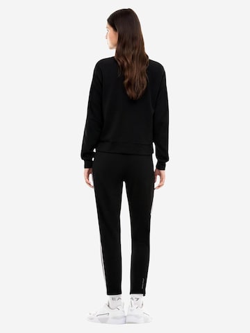 EA7 Emporio Armani - Slimfit Pantalón deportivo '7W001518 AF12501' en negro
