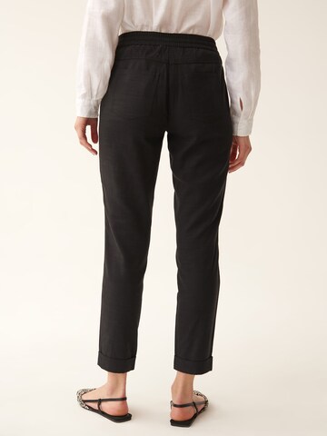 Regular Pantalon 'Sumiko' TATUUM en noir