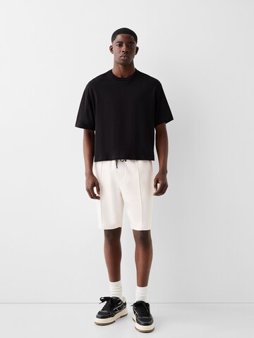 Largi Pantaloni de la Bershka pe alb