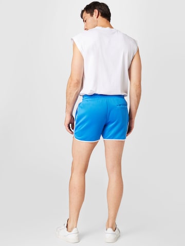 Karl Kani Regular Shorts in Blau