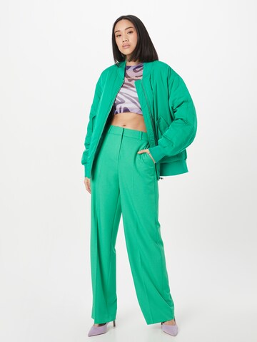 COMMA Zvonové kalhoty Kalhoty s puky – zelená