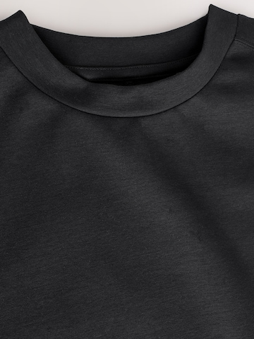 Robe Next en noir